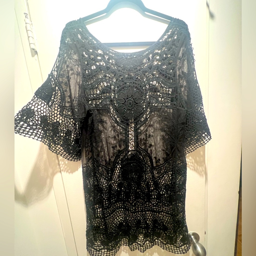 Guipure, lace and embroidered chiffon dress in black.